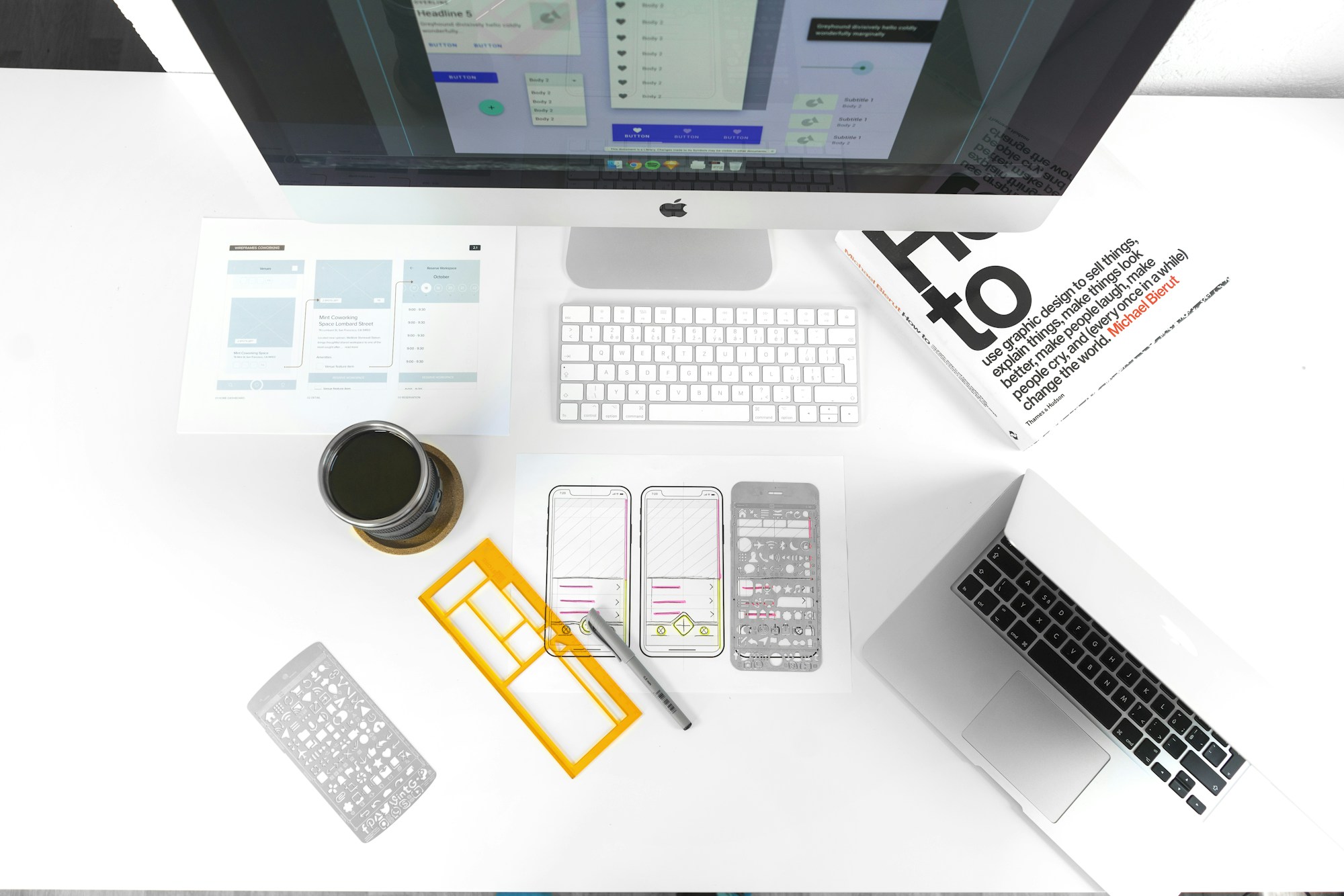 A desk featuring a computer, keyboard and mouse